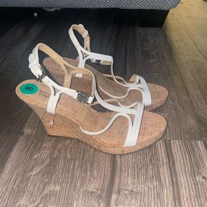 Michael kors white wedges. Never used. Been sitting in closet